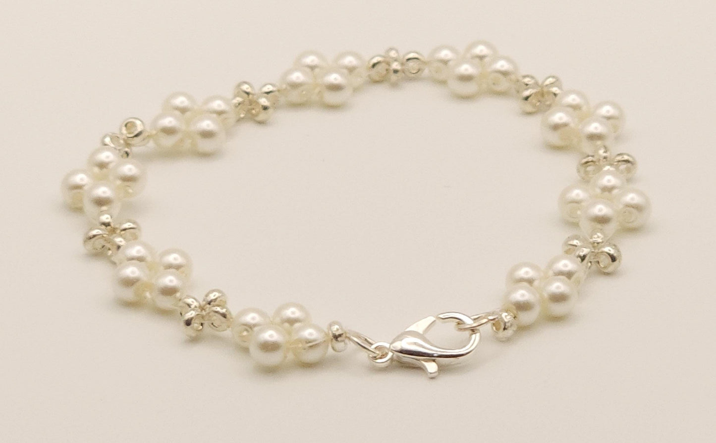 Sophisticated Silver and Pearl-Colored Plated Glass Beaded Bracelet