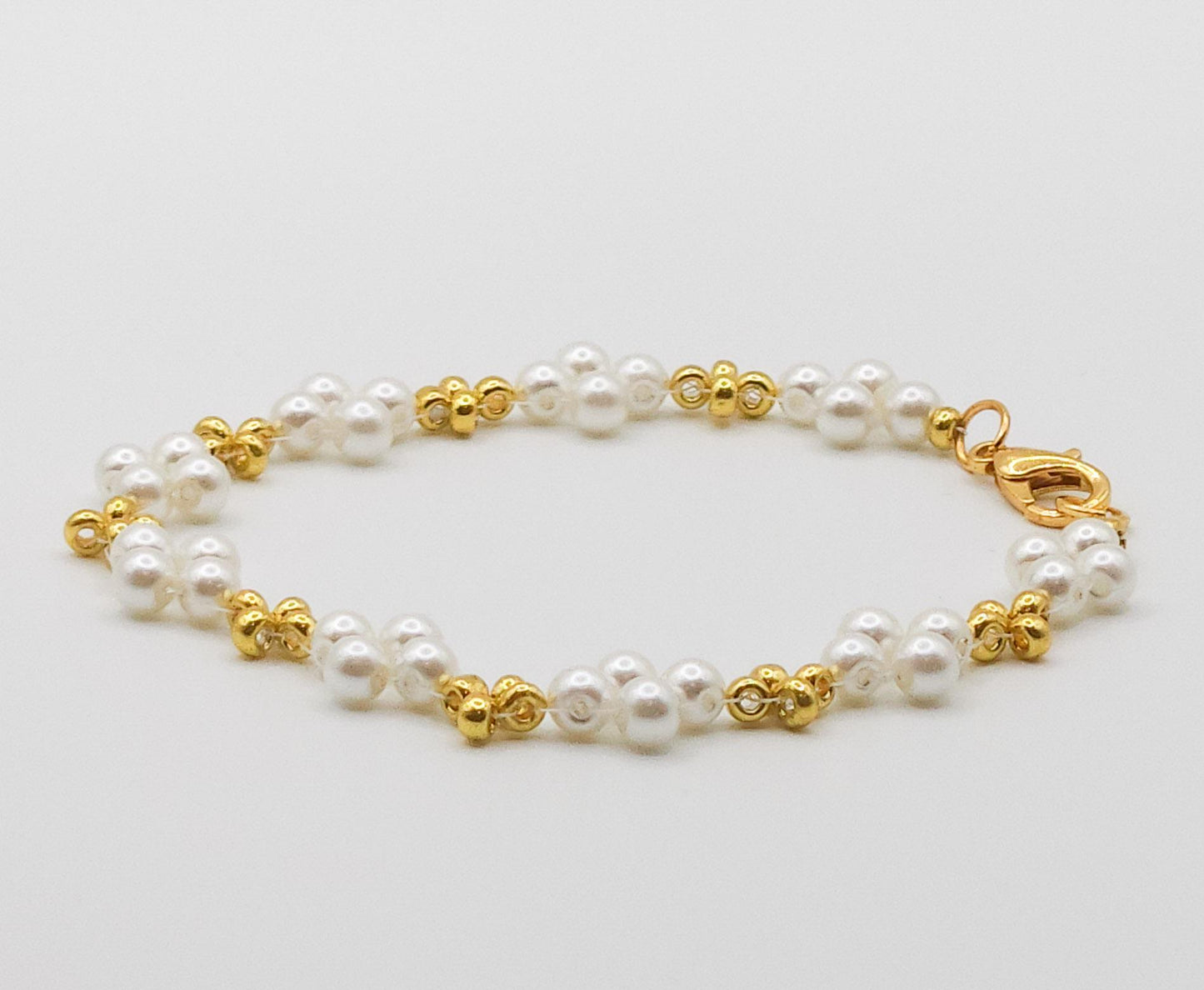 Elegant Gold and Pearl-Colored Plated Glass Beaded Bracelet