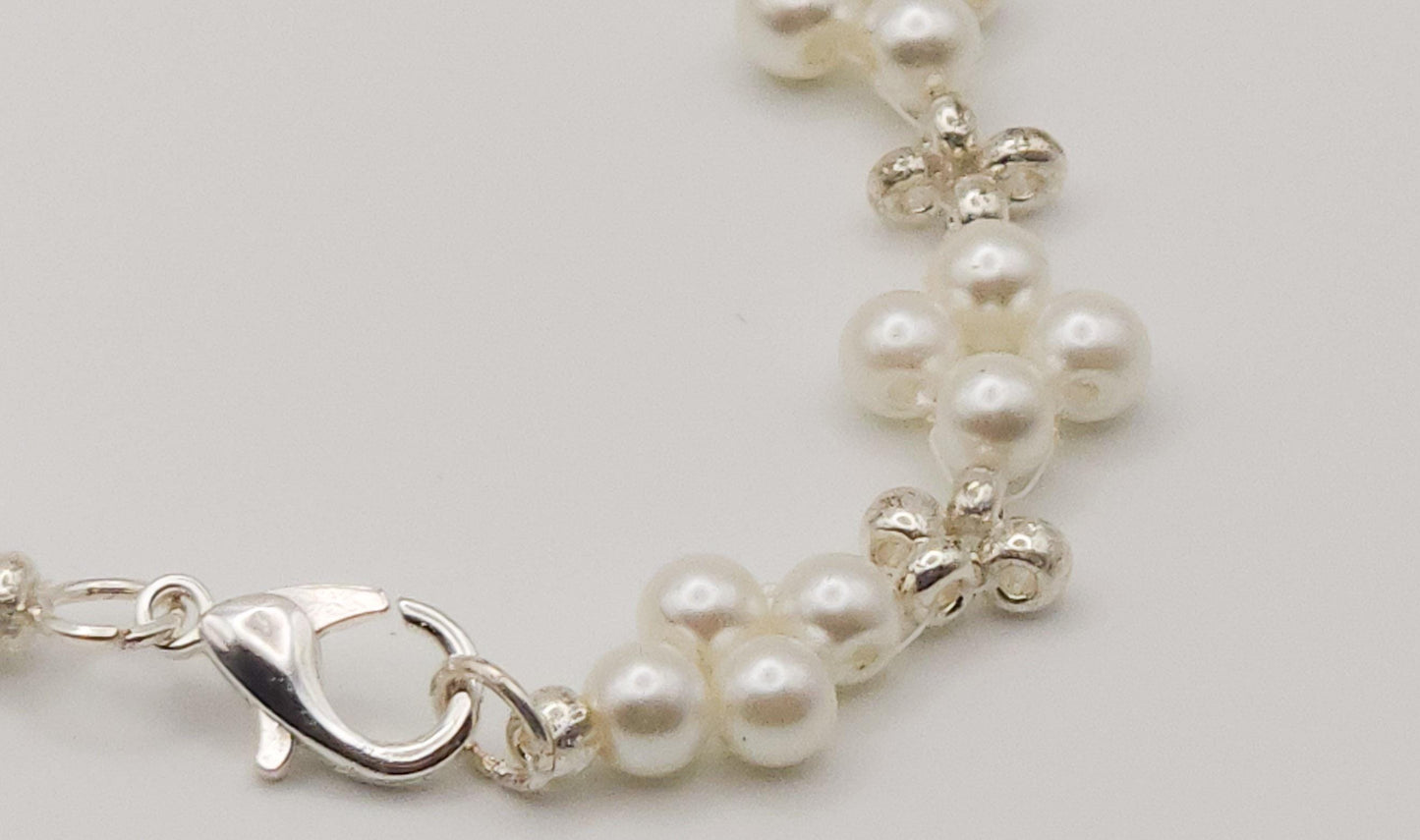 Sophisticated Silver and Pearl-Colored Plated Glass Beaded Bracelet