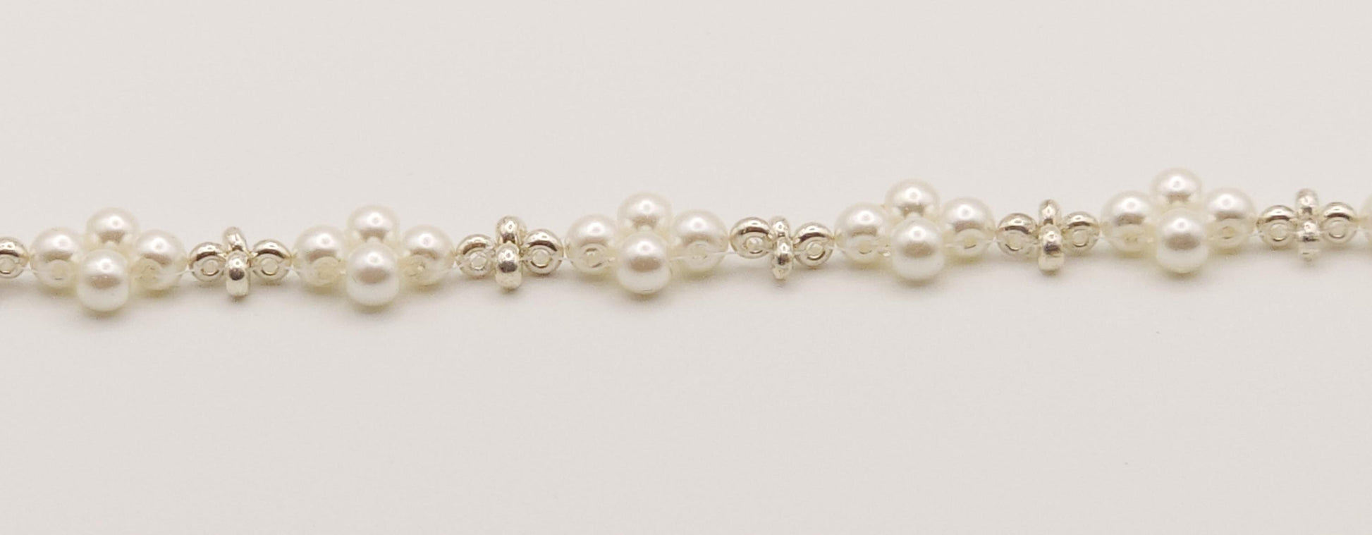 Sophisticated Silver and Pearl-Colored Plated Glass Beaded Bracelet